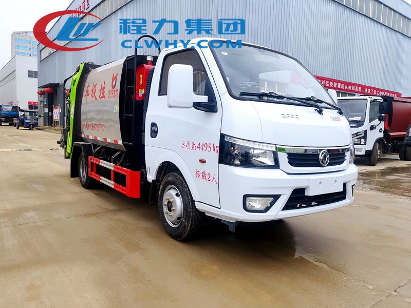 東風(fēng)途逸藍(lán)牌壓縮垃圾車發(fā)車杭州(圖1)